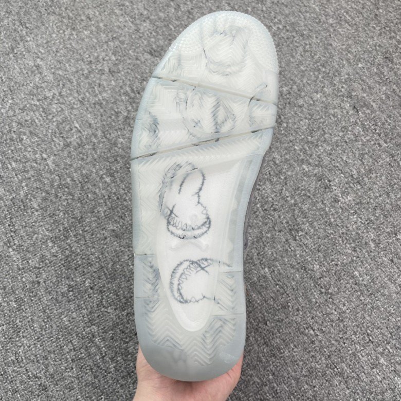 Kaws X Air Jordan 4 Retro Grey 2017